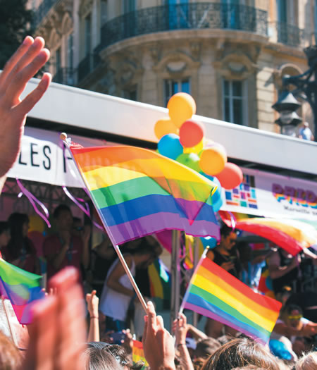 Flag waving at a Pride Parade