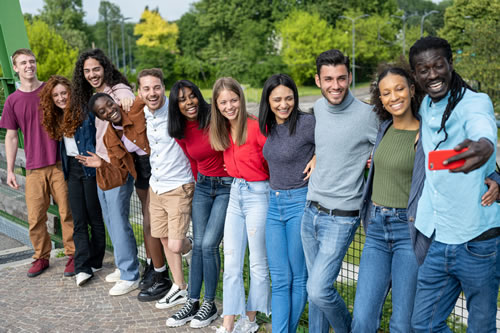 Young people arm-to-arm in a line