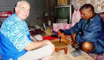 Fr. Frank Hoare drinking yaqona with an Indo-Fijian friend.