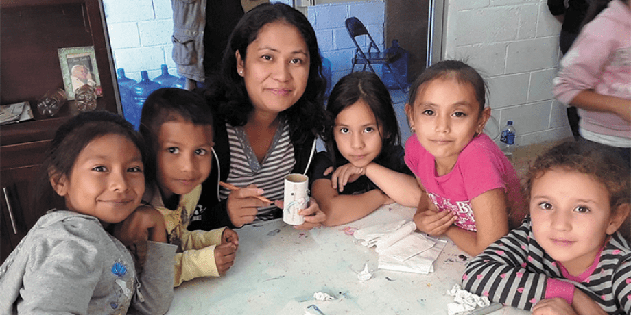 Rosalia working with children