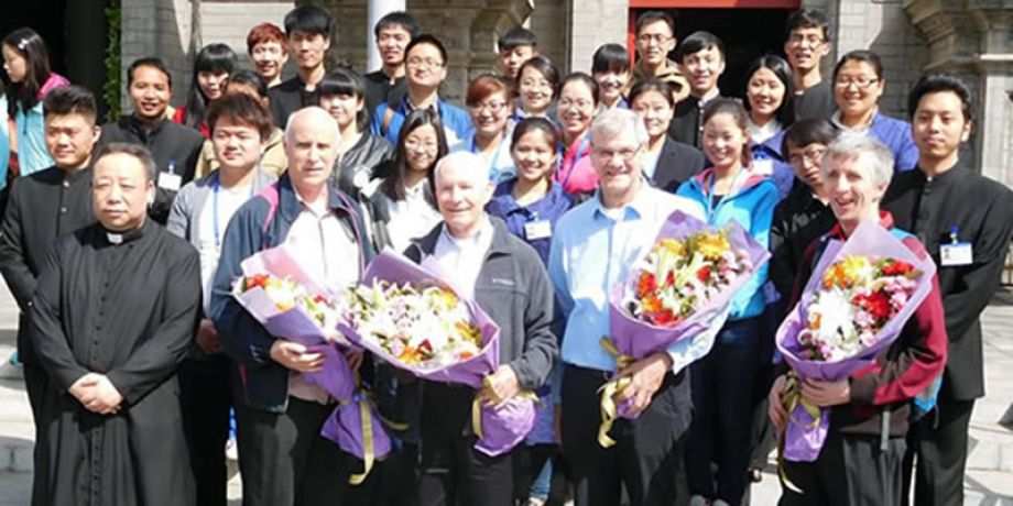 Omaha, Neb., Archbishop George Lucas (first row, center) is welcomed to China by Chinese church at South Cathedral in Beijing.