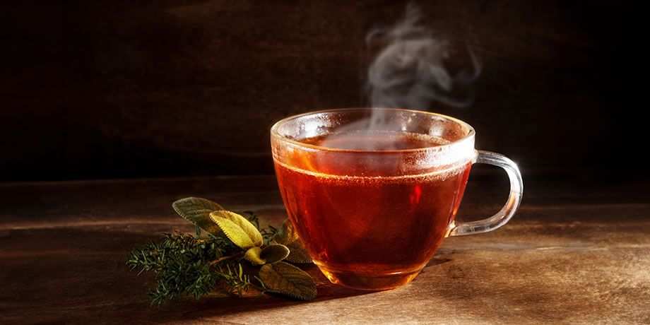 Steaming cup of tea on a table