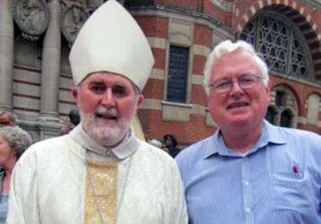 Fr. Peter Hughes (right) at a Mass for Migrants