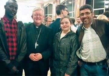 Julia with Archbishop Bernard (second from left) and lay missionaries.